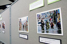 Pictures of the 2011 Tohoku Earthquake and Tsunami, exhibited by the Honolulu Consulate General of Japan, shared sights of people helping each other, supporting each other in order to live and survive.
